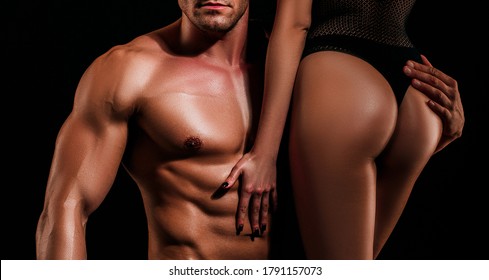 Sensual Romantic and loving couple. Intimate relationship and sexual relations. Dominant man. Passion and sensual touch. Beautiful passionate lovers on black background