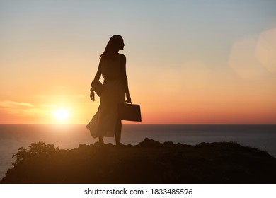 Sensual Woman Posing On Sunset Landscape. Lifestyle Change And Travelling Concept. Life Work Balance, Freelance Idea