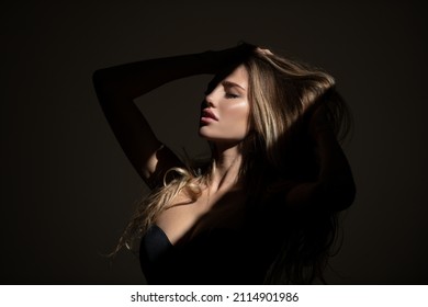 Sensual Woman With Shadows On Beautiful Face. Sensual Girl With Art Shadow Light.