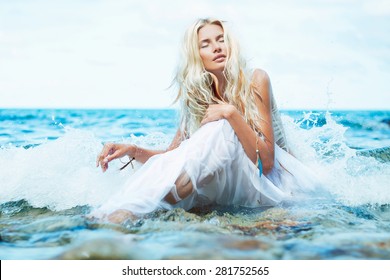 Sensual Young Beauty In Water . Soft Focus.