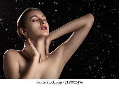 sensual young woman on stars background with copy space