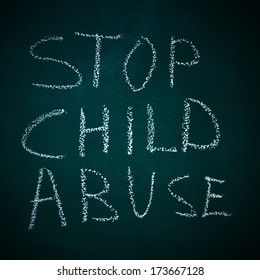 sentence stop child abuse written in a chalkboard
