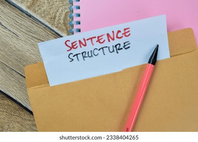 Sentence Structure text with document brown envelope isolated on office desk