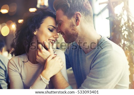 Sentimental happy couple in love bonding
