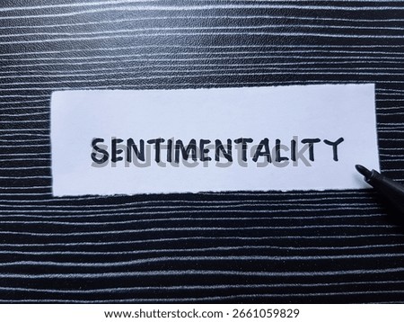 Sentimentality writting on table background.