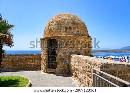 Sentry box of the Lantern Tower along the historic city walls of Alghero on the coast of the Mediterranean Sea in Sardinia, Italy