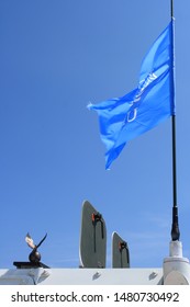 Sentul, West Java, Indonesia - May 18th, 2011: The UN Blue Flag On The Top Of White Battle Tank