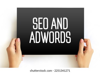 Seo and Adwords text on card, business concept background