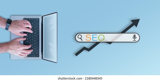 SEO Concept, Top Down View Of Search Bar And Person Using Laptop Computer Against Blue Background