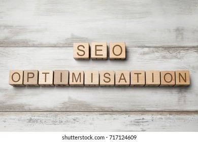 Seo Optimisation Text On Wooden Cubes On Wooden Background