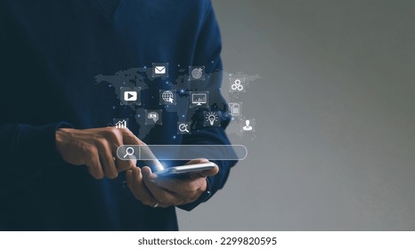 SEO Search Engine Optimization concept. Men use smartphone with SEO icons for promoting ranking traffic on websites and optimizing their websites to rank in search engines or SEO. - Powered by Shutterstock