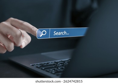 SEO, Search engine optimization concept. Data search technology. Person using laptop with search bar on virtual screen.