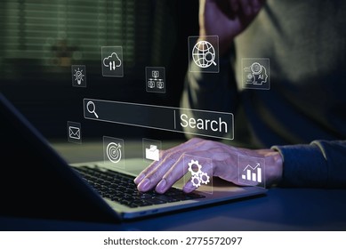 SEO search engine optimization concept. Person typing on laptop with digital search bar and marketing icons to represent web browsing data analysis, professional online discovery, AI search, SEM, GEO