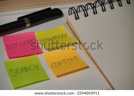 SEO or search engine optimization concept. Paper with SEO ideas or plan for social media