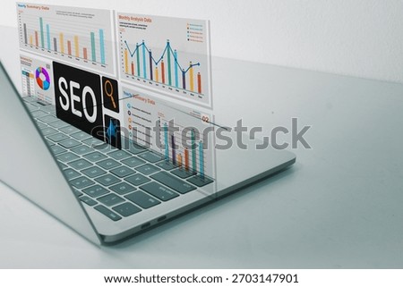 SEO (Search Engine Optimization) concept. Laptop with virtual dashboard for marketing data analysis, reports, and charts. Business analytics with copy space.