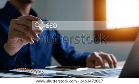 SEO, Search Engine Optimization Man taps search bar on virtual screen to search for information surf the internet Working with a laptop computer