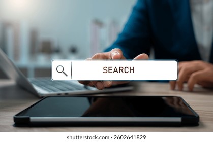SEO search engine optimization, SEO tools,  Businessman using laptop and tablet to gain insights into search engine technology, Browsing the internet, and connecting to the digital world.