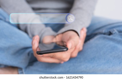 SEO, Search Engine Optimization, Web browser concept. Young casual man internet networking, browsing  data on mobile smart phone and laptop computer, for website  or homepage