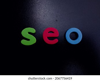 SEO word, Search Engine Optimization. Internet Marketing and Web Analytics. Website traffic, web page visibility, online marketing and seo tools concept.