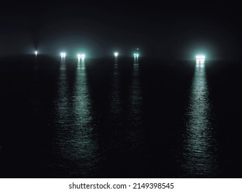 Seogwipo-si, Jeju-do, South Korea - August 1, 2006: Night View Of Multiple Light On The Sea From Squid Fishing Boats
