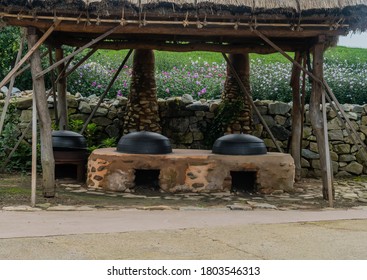 Seosan, South Korea; August 14, 2020: For Editorial Use Only.Old Fashioned Cooking Cauldrons Set In Primitive Earth Oven At Haemieupseong Fortress.