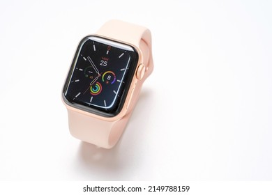 Seoul - 23.04.2022: Apple Watch With Pink Strap On White Background Close Up.