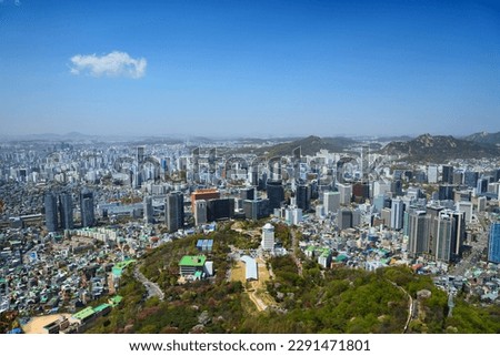 Seoul cityscape in South Korea. City landscape of Jung district (Jung-gu), with Hoehyeon-dong and Jungnim-dong neighborhoods. Namsan Park in foreground.