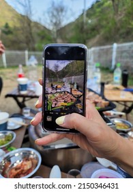 Seoul, Korea - Apr 23 2022: Taking Photo With Iphone Outside. Smartphone Camera Taking Picture With On Hand.