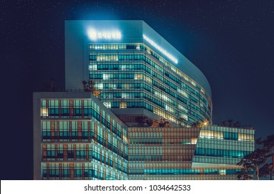 SEOUL, KOREA - AUGUST 12, 2015: Yonsei Univercity Cancer Center At Night - Writing On The Building Means 