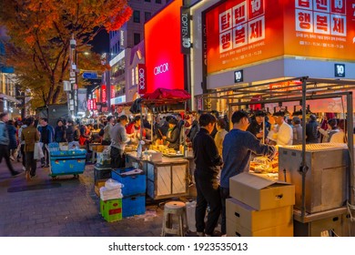 SEOUL, KOREA, NOVEMBER 9, 2019: Myeongdong food market during night at Seoul, Republic of Korea