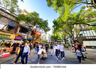 SEOUL, KOREA - OCTOBER 3, 2015 : Insadong shopping street, Korean people tourists walking shopping the neighbourhood. It is fashionable to be the most popular. neighbourhood is must when traveling.