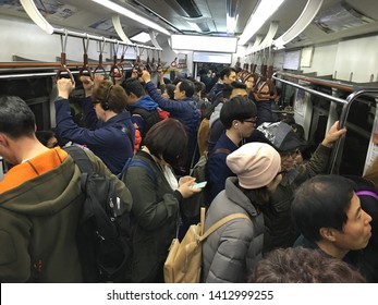 SEOUL - MARCH 25, 2017: A Lot Of People Stand In A Korail Underground Carriage. Korea Railroad Corporation (Korail), Is The National Railroad Operator In South Korea.