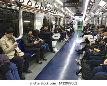 SEOUL - MARCH 27, 2017: Unidentified People Sit In A Korail Underground Carriage. Korea Railroad Corporation (Korail), Is The National Railroad Operator In South Korea.