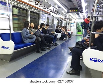 SEOUL - MARCH 29, 2017: Unidentified People Sit In A Korail Underground Carriage. Korea Railroad Corporation (Korail), Is The National Railroad Operator In South Korea.