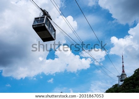 Seoul Namsan Mountain Cable Car with Blue Sky Background.