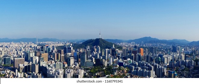 Seoul Skyline On A Perfect Day With A Focus On Central Business District While Parts Of Gangnam Business District And Lotte Tower Are Visible In A Distance.