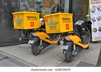 Seoul South Korea 25 January 2020: two parked McDonalds home delivery motorbikes