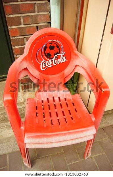 \
Seoul, South Korea - 6 3 2012: The red chair with\
the Coca-Cola logo.