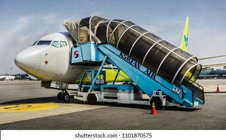 Seoul, South Korea - April 10,2018: Motorised Passenger Stair allowing passengers to unload from the airplane at  Gimpo Airport (GMP),  third largest airport in Korea.
