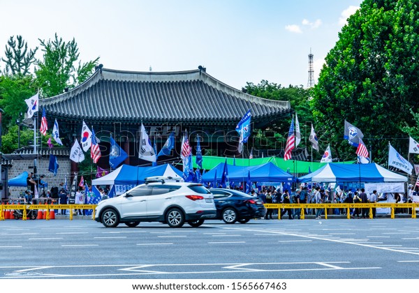 Seoul, South Korea - AUG 2019: Supporters of\
former President Park Geun-hye and US President Trump participated\
in demonstrations against the incumbent government front of\
Deoksugung Palace