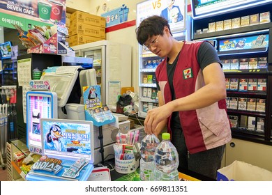 SEOUL, SOUTH KOREA - CIRCA MAY, 2017: Worker At 7-Eleven Convenience Store. 7-Eleven Is An International Chain Of Convenience Stores.