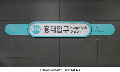 Seoul, South Korea, Feb 24 2021: Hongdae Univ. Subway Station Sign At Gyeongui Line.