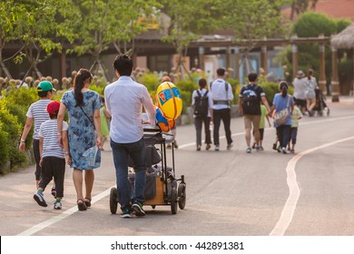 Seoul, South Korea - June 13, 2016 : Big Family Walking Away From The Behind In Park