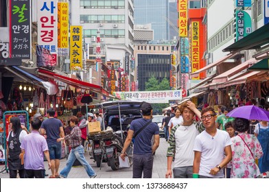 SEOUL / SOUTH KOREA - JUNE 30, 2013: Bustling Busy Area Of Foot Traffic And Commerce In Seoul, South Korea