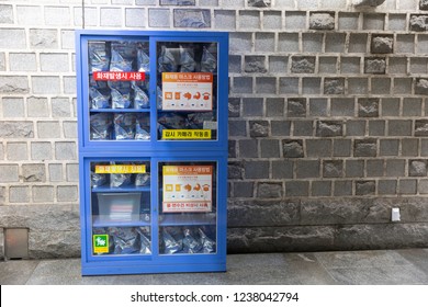 Seoul, South Korea - October 22, 2018: Relief Goods Storage In A Subway Station In Busan, South Korea. Contains A Smoke Masks, Drinking Water And A User Manual For Emergency.