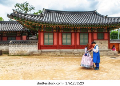 Seoul, South Korea, October 3th, 2017: A South Korean Family Visiting Historical Changdeokgung Site In Seoul, With Traditional Hanbok Clothes.