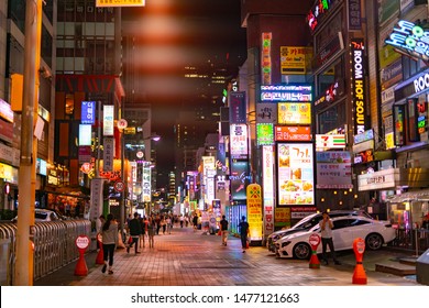 Seoul, South Korea- September 16, 2018: Panoramic View Of The Modern Streets Of Seoul Full Of Life, Full Of People And Business Lights At Night