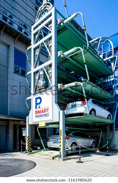 Seoul, Seoul / South\
Korea - September 24 2015: Close-up of rotary automated smart\
vehicle parking system in commercial building of Gangnam district,\
Seoul downtown