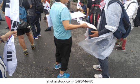 Seoul, South Korea; September 7, 2019:Volunteer Trying To Get Signatures On Petition During Demonstration Against South Korean President Moon Jae-In.