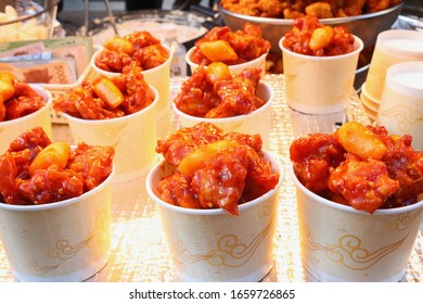 Seoul, South Korea/April 16, 2018: Cups Of Spicy Korean Fried Chicken At A Street Food Market In Seoul's Myeong-dong Neighborhood. 